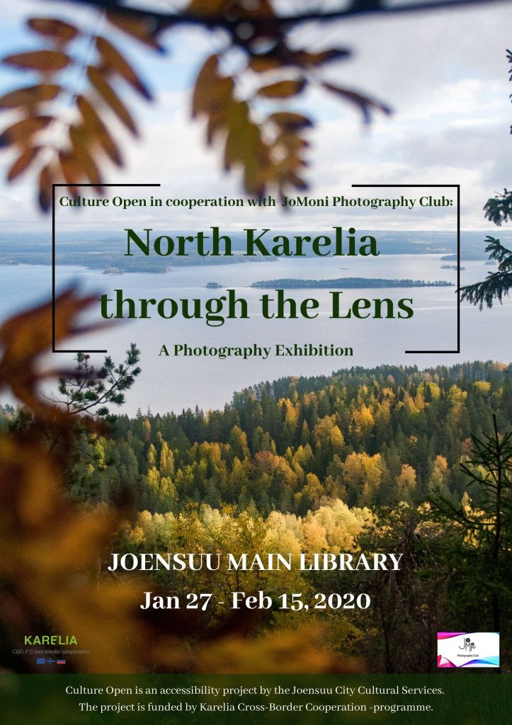 exhibition poster shows a view from Koli through some trees towards a lake.